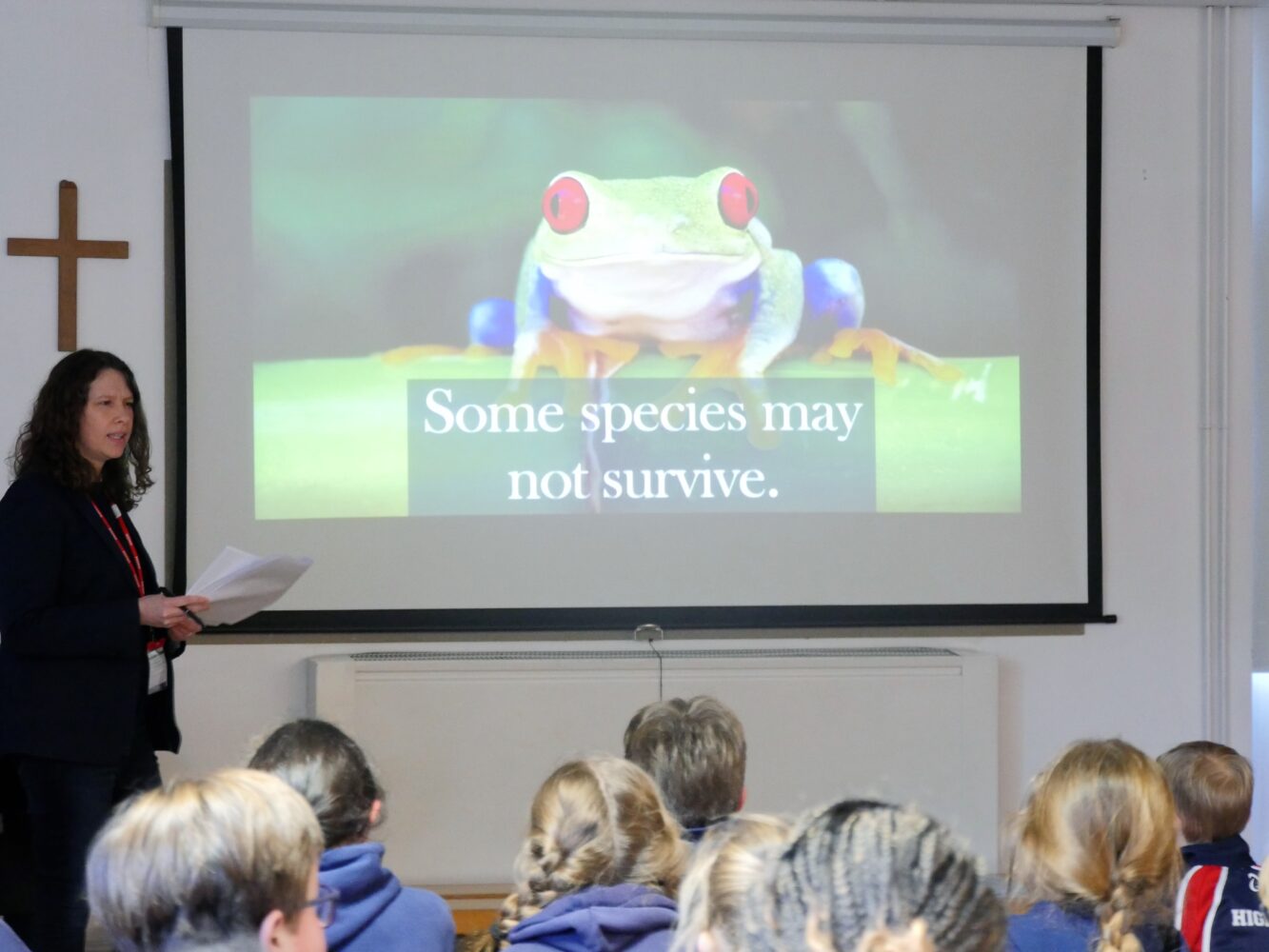 Climate expert Caroline Linford talking to school children