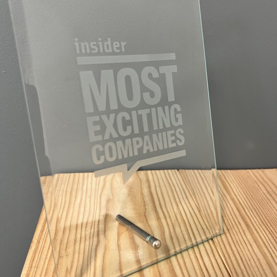An Insider Most Exciting Companies award sits on a desk