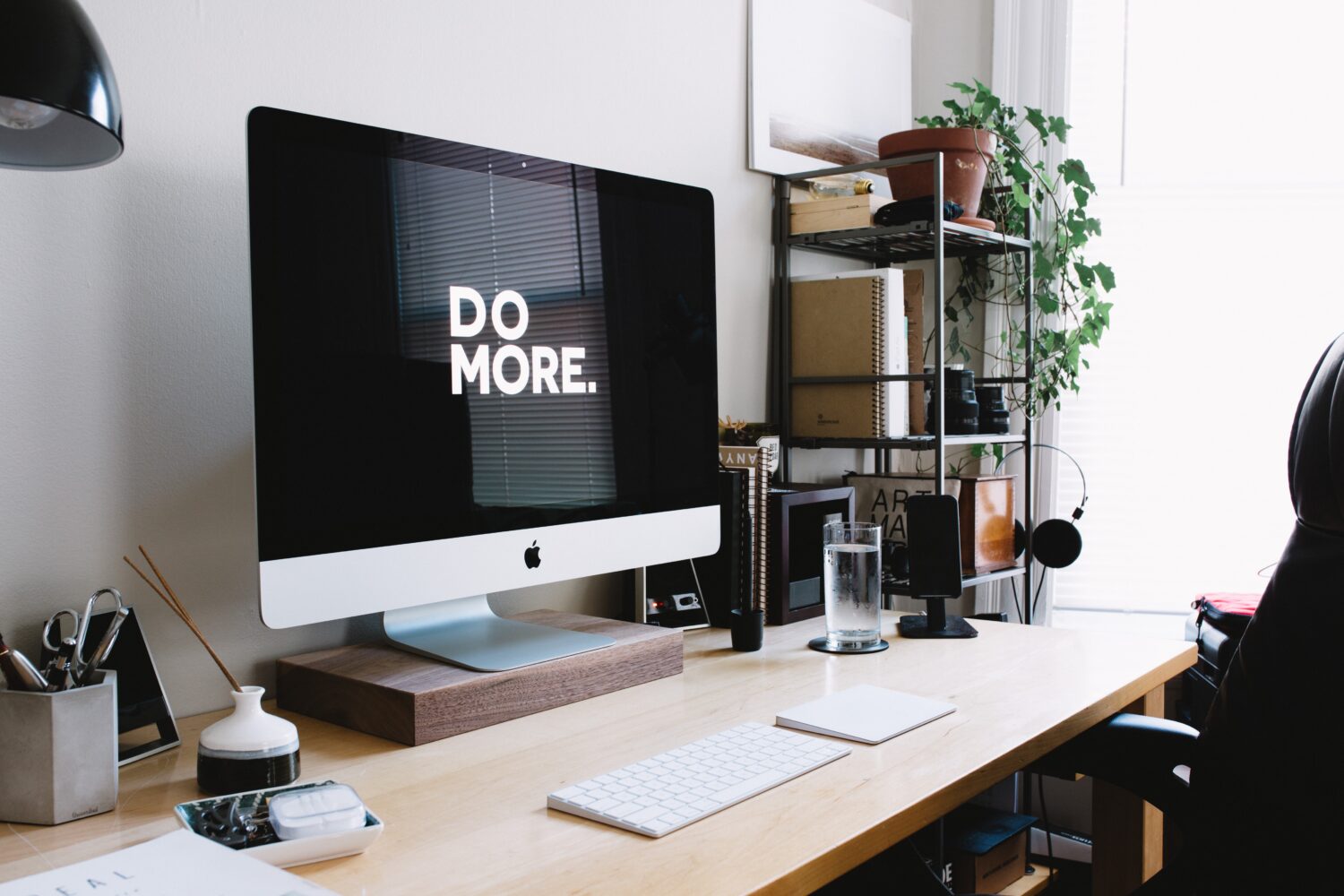 A desktop computer features the words do more